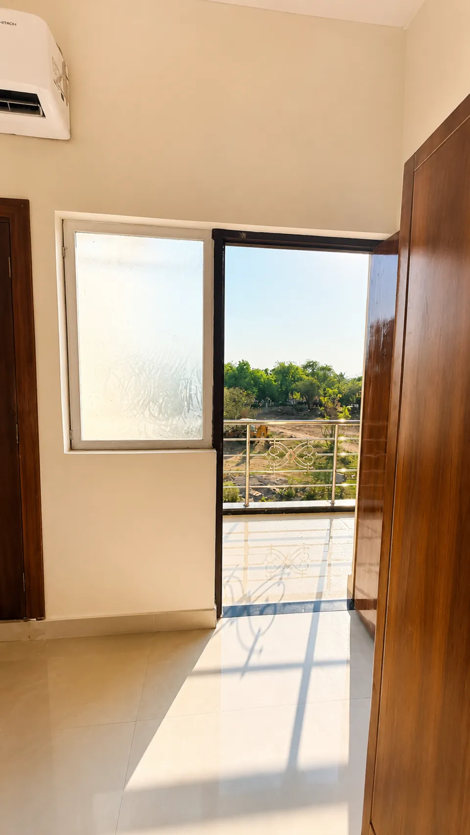 Balcony doorway with outdoor view